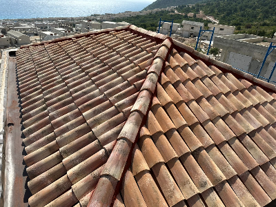 Ndertim catie druri me tjegulla tradicionale Ndertim catie druri me tjegulla tradicionale